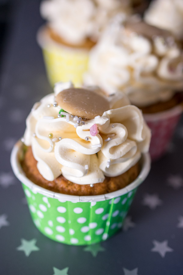 Butterbeer cupcake topped with Butterbeer Italian Meringue Buttercream, sprinkles and a Caramac button 