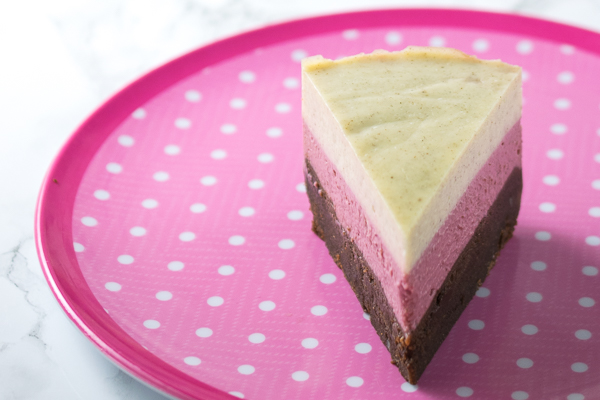Instant Pot Neapolitan Cheesecake - layers of vanilla and strawberry cheesecake on top of a chocolate brownie base, cooked in the pressure cooker!